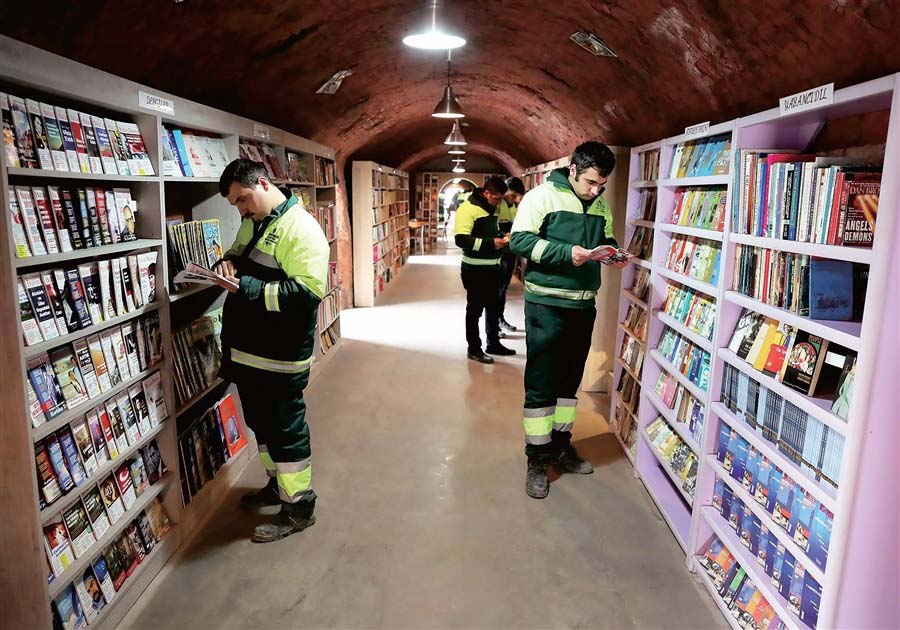 Waste Collectors Create a Library with Abandoned Books on the Street